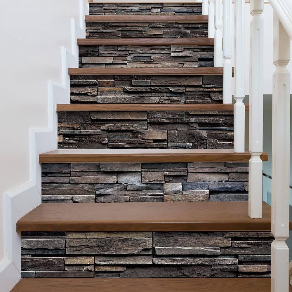 Staircase with dark stone risers and wood treads